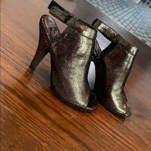 Black and gold suede heels